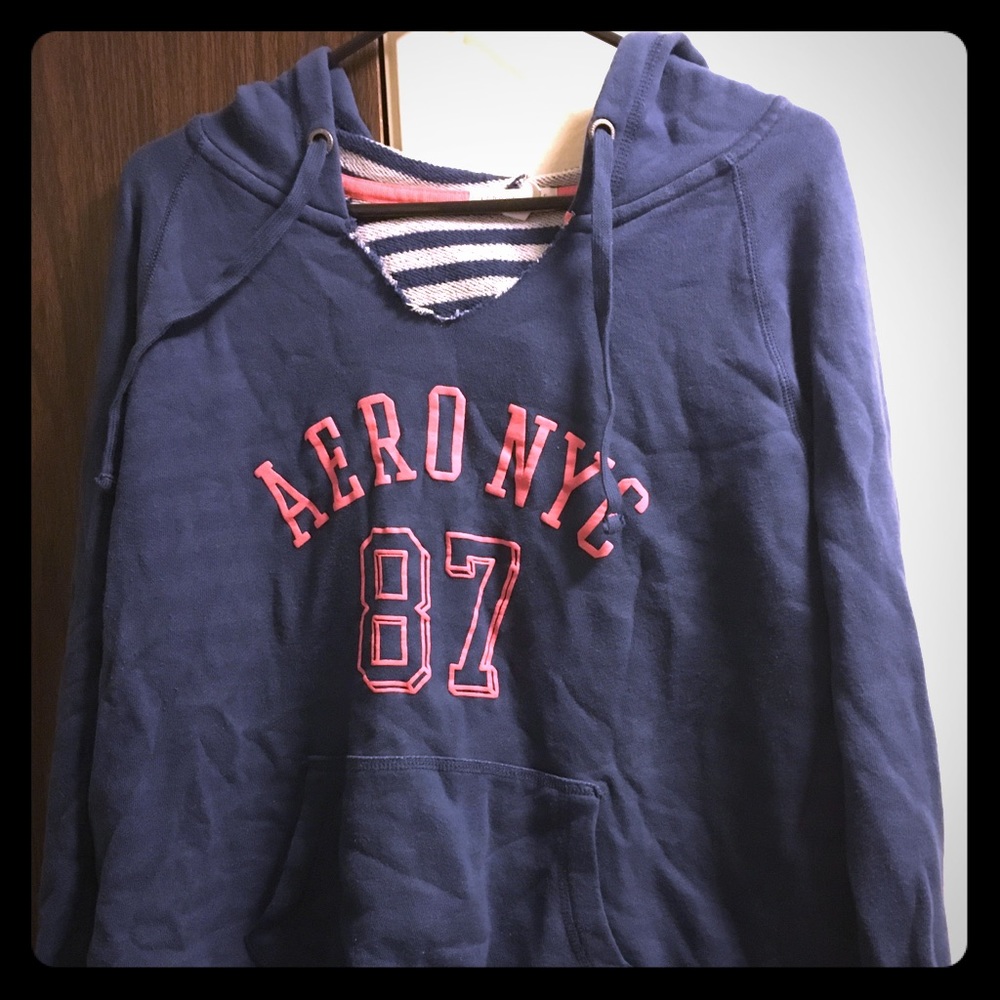 Cool blue hoodie with peach color writing